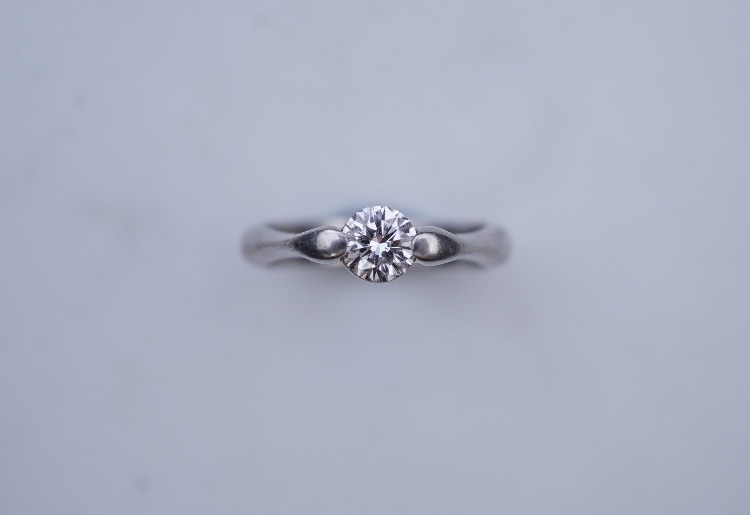A diamond solitaire ring